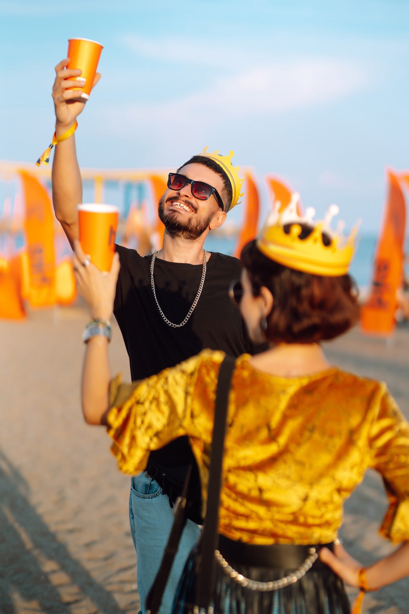 lovely-couple-having-fun-festival-young-friends-with-beer-at-beach-party-summer-holiday-vacation-.jpg